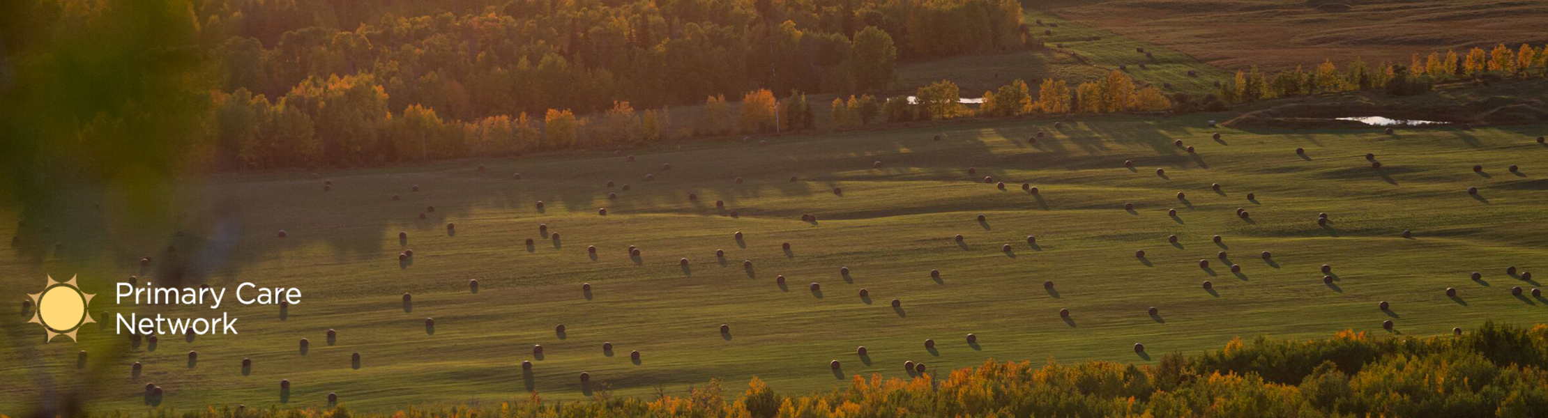 field with river in background Dawson Creek