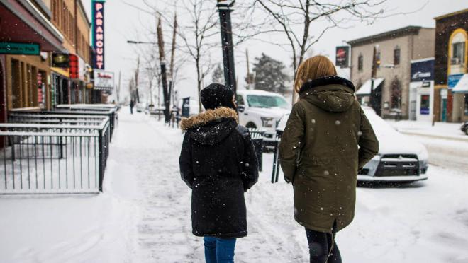 walk on snow covered sidewalk